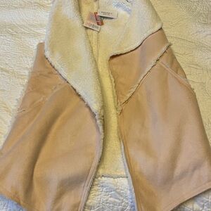Suede vest. Never worn.
